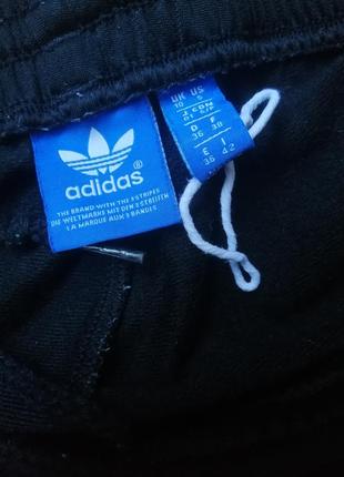 Штани adidas штани джинси7 фото