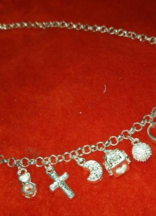 Кольє з різними кулончиками