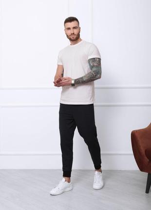 Стильные спортивные штаны с манжетами3 фото
