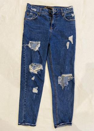 Женские джинсы с дырками1 фото