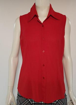 Блузка красная на пуговицах без рукавов "xingiaaolisi" (китай).2 фото