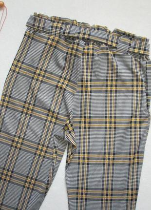 Шикарные трикотажные стрейчевые брюки в клетку с поясом высокая посадка quiz.5 фото