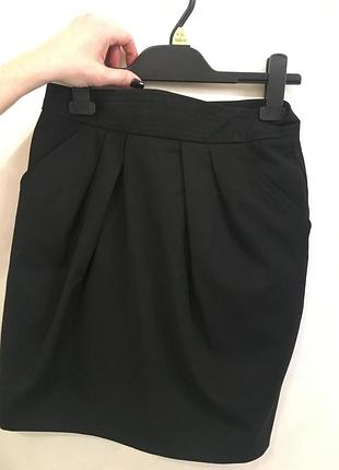 Ділова спідниця з карманами