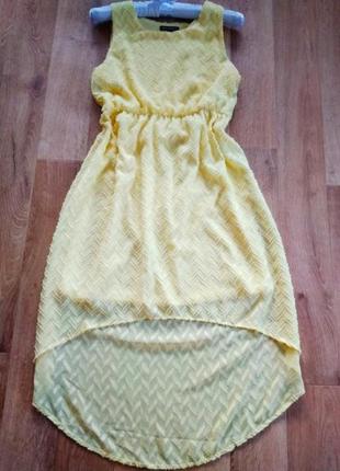 Удлинненное ззаду плаття