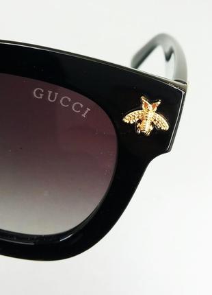 Gucci жіночі сонцезахисні окуляри чорні з мушками поляризированые8 фото