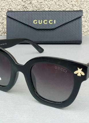 Брендові  жіночі сонцезахисні окуляри чорні з мушками поляризированые