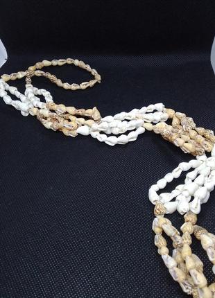 Бусы ожерелье  ракушка каури белого песочного цвета3 фото
