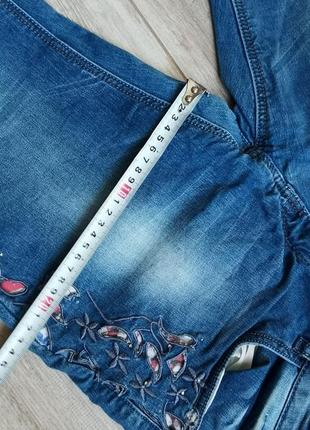 Нарядные джинсы с перфорацией р. 306 фото