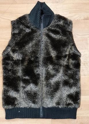 Женская жилетка