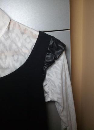 Интересное платье с кожаными вставками-воланами и поясом4 фото