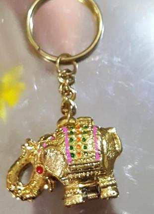 Новые  металлические брелки" cлоники" символ достатка  с секретом.