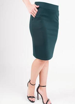 Спідниця-олівець, темно-зеленого кольору з кишенями