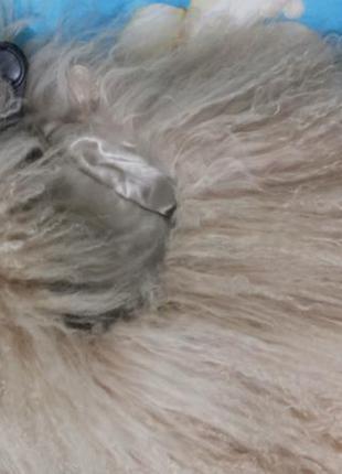 Меховая жилетка из ламы5 фото
