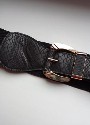 Ремень пояс резинка эко кожа спереди на пряжке.