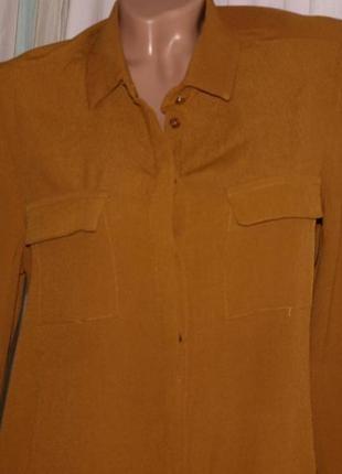 Красивая блуза (м-л замеры) 100% вискоза, с кармашками ,к телу приятная, цвет горчица.