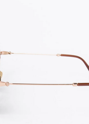 Жіночі сонцезахисні окуляри коричневі3 фото