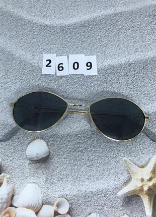 Сонцезахисні окуляри чорні крапельки к. 26092 фото