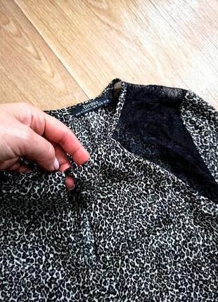 Интересная блуза принт леопард с чёрным гипюром

bershka7 фото
