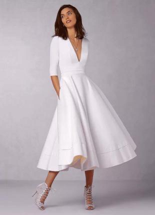Платье белое расклешенное7 фото