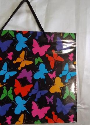 Подарочный пакет для упаковки подарка.