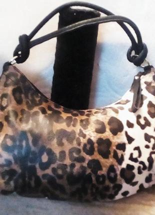 Дуже славна сумка,супер зручна,м'яка з леопардовим принтом,еко шкіра👍👍👍1 фото