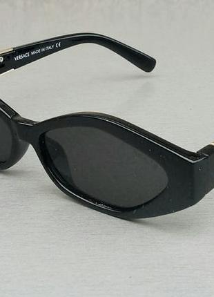 Окуляри брендові  жіночі сонцезахисні окуляри вузькі чорні з золотим логотипом