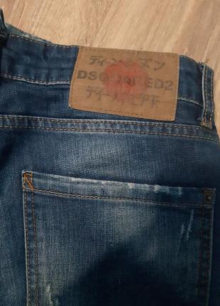 Фирменные джинсы с потертостями зауженные dsquared6 фото