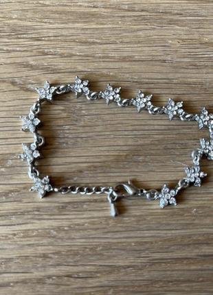 Браслет со звёздочками с камнями swarovski серебристый металлический9 фото