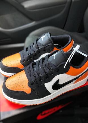 Отличные женские кроссовки nike air jordan 1 low оранжевые с чёрным5 фото