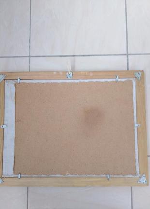 Картина вышитая крестиком "лебеди".