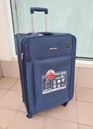 Большой чемодан на четырех колесах airtex 9163 france