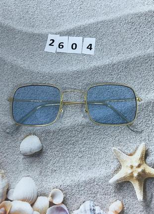 Стильні окуляри з блакитними лінзами в золотистій оправі к. 26042 фото