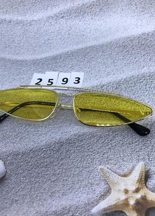 Жовті стильні окуляри в золотистій оправі к. 25932 фото