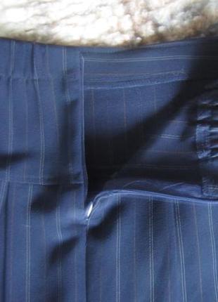 Тёмно-синяя юбка в полоску  со складками р. 10 128-134 см3 фото