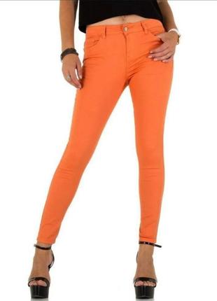 Брюки джинсы штаны оранжевые1 фото