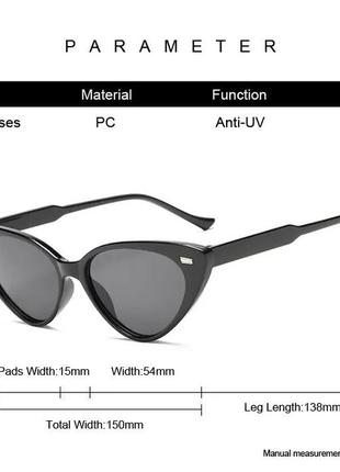 Женские солнцезащитные очки кошачий глаз чёрные с металлической вставкой7 фото