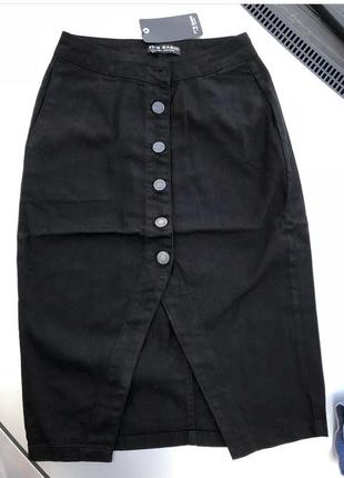 Джинсовая юбка по фигуре на пуговицах с разрезом2 фото