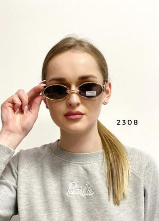 Овальні сонцезахисні окуляри з чорними лінзами к. 2308