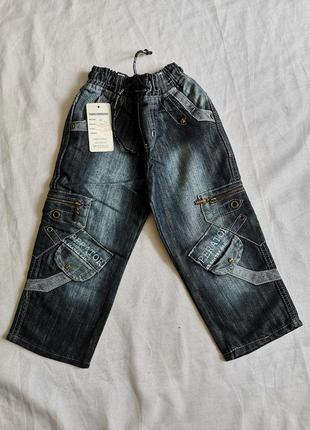 Джинсы 8
