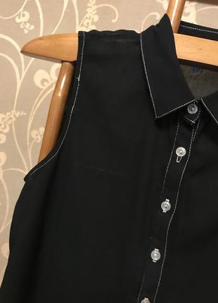 Очень красивая и стильная брендовая блузка чёрного цвета.5 фото