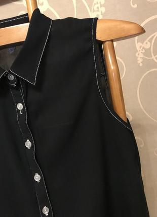 Очень красивая и стильная брендовая блузка чёрного цвета.7 фото