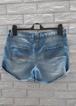 Стильні джинсові шорти рванки george 12/40 розмір.2 фото