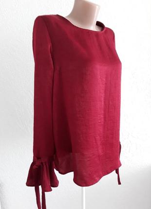 Блузка с переливом ткани и рюшами на рукавах