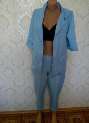 Модный летний голубой костюм1 фото