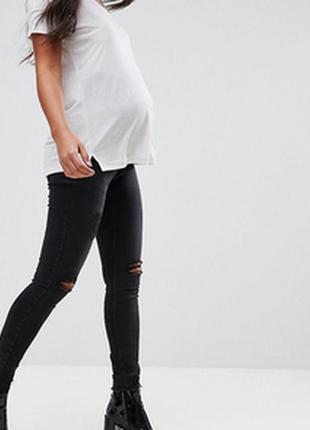 Черные джинсы штаны для беременных с декоративными порезами на коленях.8 фото
