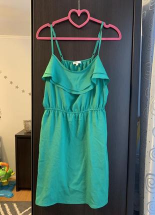 Літнє зелене плаття з рюшами
