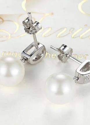 Роскошные серебряные серьги sea shell pearl2 фото