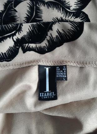 Izabel  юбка зауженая трикотаж бежевая с велюровый чёрным принтом ,размер 483 фото