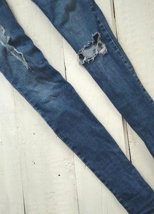 Стильные рваные джинсы4 фото