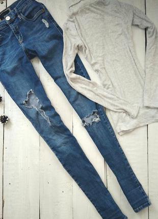 Стильные рваные джинсы2 фото